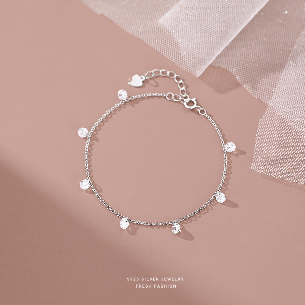 Pulsera americana con dijes de plata y diamantes