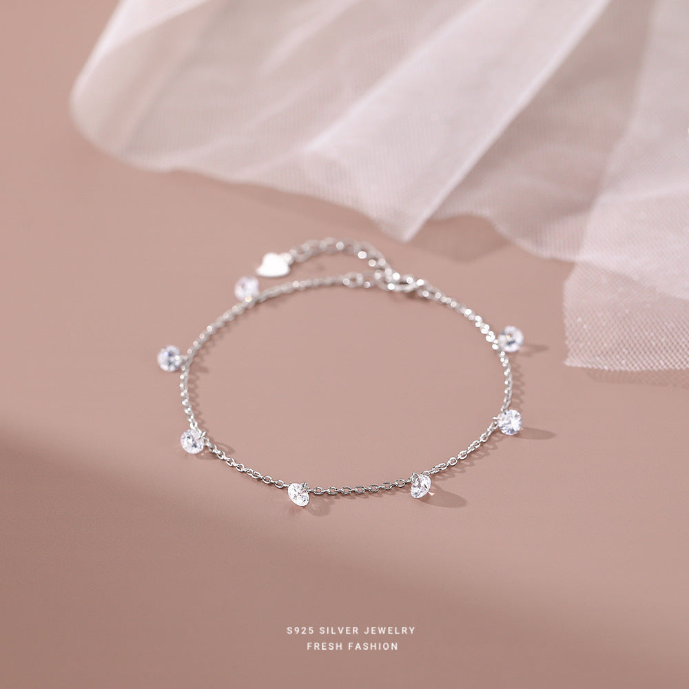 Pulsera americana con dijes de plata y diamantes