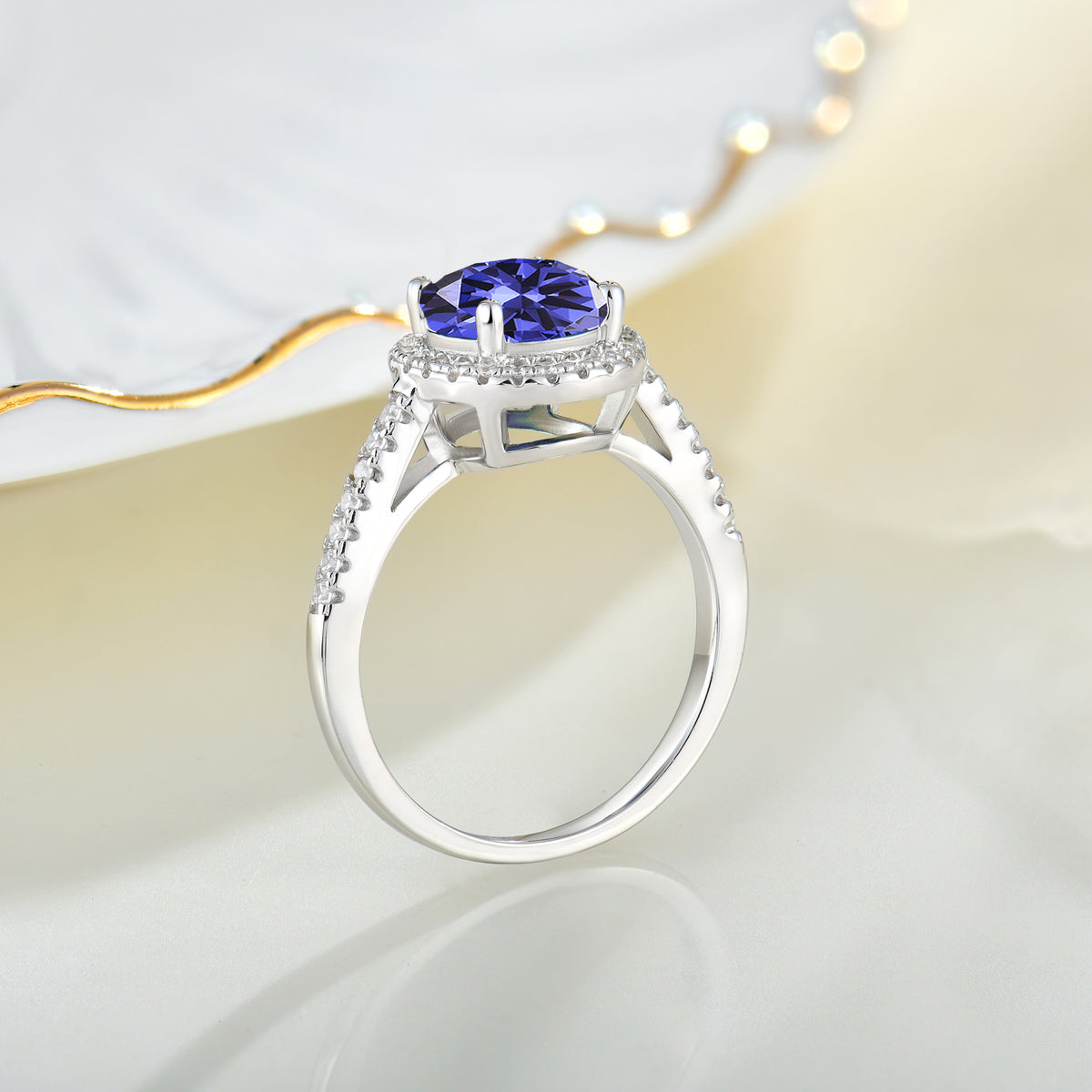 Runder Halo-Tansanit-Ring