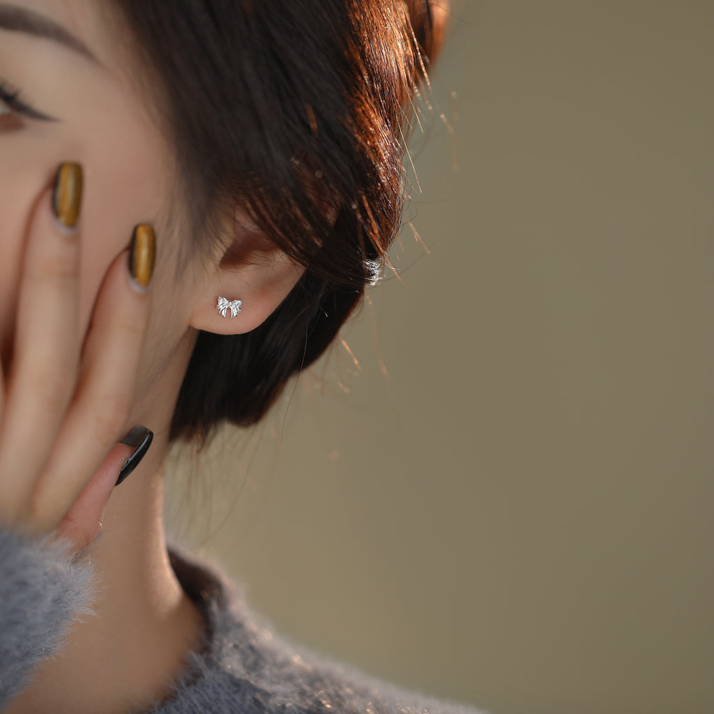 999 Silver CZ Bow Pure Stud Earrings