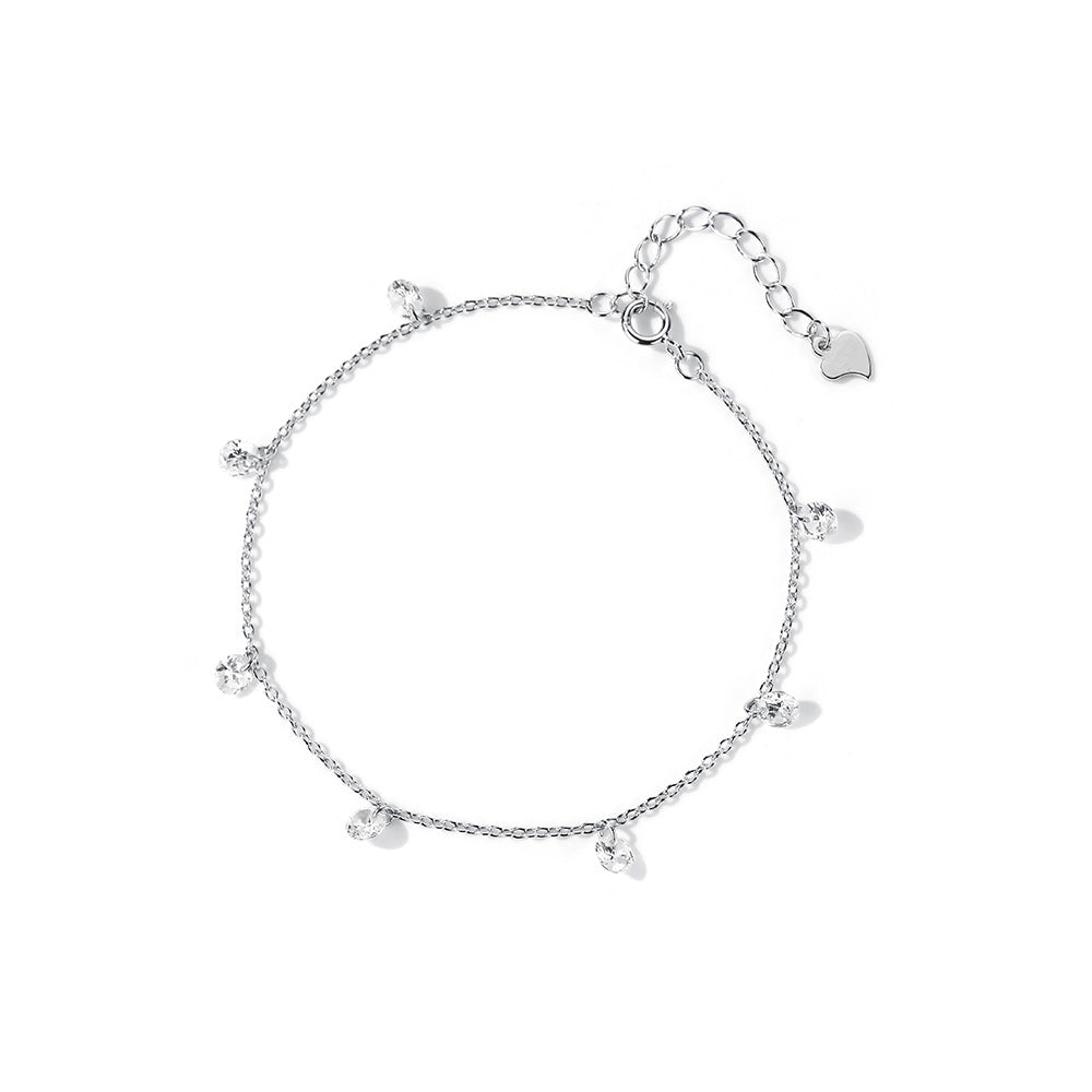 Pulsera americana con dijes de plata y diamantes