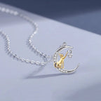 Golden Cat In Crescent Moon Pendant Necklace