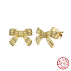 Golden knot stud earrings