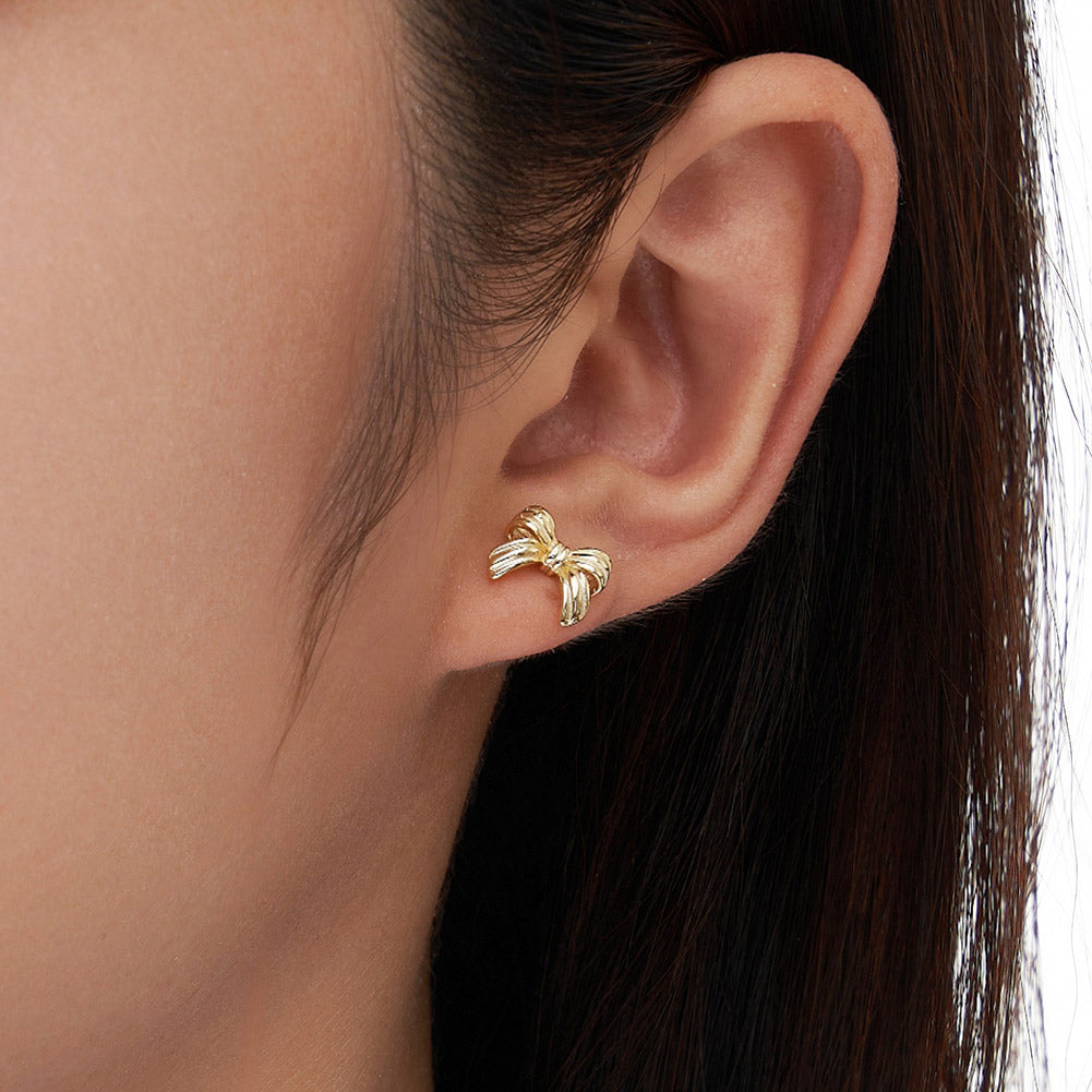 Golden knot stud earrings
