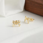 Golden knot stud earrings